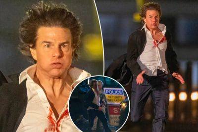 Bloody Tom Cruise sprints through London with wild hair in ‘Mission: Impossible 8’ set photos - nypost.com - Britain - London