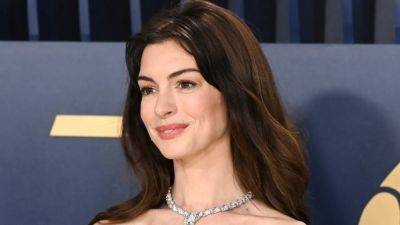 Anne Hathaway Is a Totally New Woman With a Faux Pixie and Dark Makeup — See the Photos - www.glamour.com - Hollywood