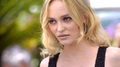 Lily-Rose Depp Wears an Exposed Thong and Jeans Like the Y2K Queen She’s Not - www.glamour.com