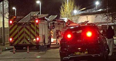 Residents told to keep windows shut as fire crews tackle blaze at industrial estate - www.manchestereveningnews.co.uk - Manchester