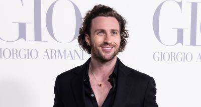 Aaron Taylor-Johnson Looks Suave in Black Suit at Giorgio Armani Photo Call in Madrid - www.justjared.com - Spain - city Milan - city Madrid, Spain