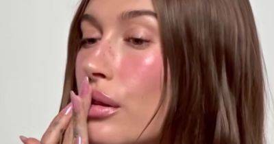 Hailey Bieber just introduced ‘pink jelly glaze’ nails as the top mani trend for spring - www.ok.co.uk