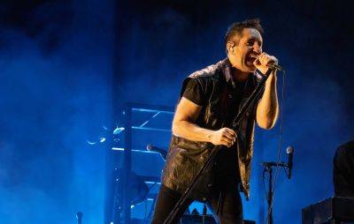 Trent Reznor on why he apologised to his record label when handing in Nine Inch Nails’ ‘The Downward Spiral’ - www.nme.com - Britain - USA