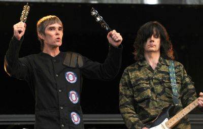 John Squire says The Stone Roses “aren’t sending each other Christmas cards or anything” - www.nme.com - Britain - Manchester