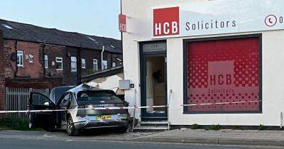 Car is smashed into solicitors building as wall crumbles around it - www.manchestereveningnews.co.uk - Manchester