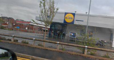 Lidl supermarket taped off after worker suffers life-changing leg injury - www.manchestereveningnews.co.uk - Manchester