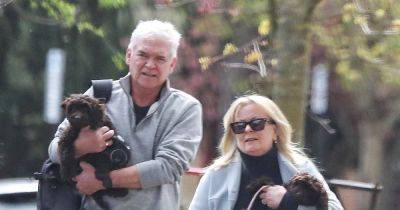 Phillip Schofield supported by loyal wife on birthday stroll after divorce vow - www.ok.co.uk