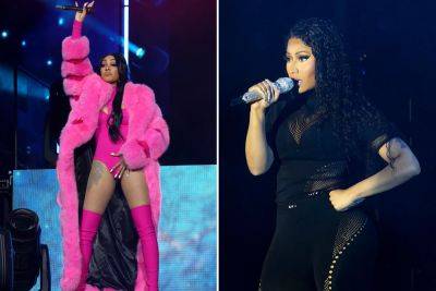 Nicki Minaj nearly gets hit by object onstage — hurls item back into crowd - nypost.com - New Jersey - Detroit