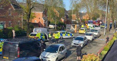 Man charged after police officers injured in crash - www.manchestereveningnews.co.uk - Manchester
