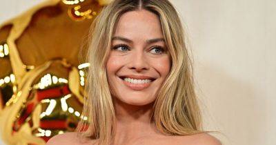 Margot Robbie's go-to beauty gadget has launched a treatment plan to give you glass skin in 2 weeks - www.ok.co.uk