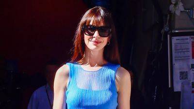 Anne Hathaway Flashed Her Abs in a See-Through Cerulean Outfit - www.glamour.com