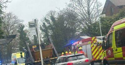 Fire crews rescue man after car flips onto its side in dramatic crash - www.manchestereveningnews.co.uk - Manchester