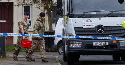 Terrified neighbours warned to 'stay inside' as bomb squad descends on street after man found dead - www.manchestereveningnews.co.uk - Manchester