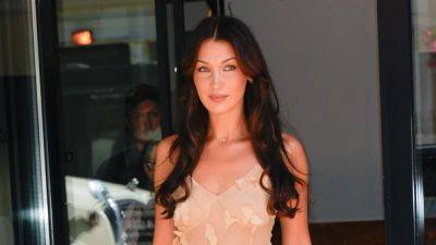 Bella Hadid Is Absolutely Glowing in the Designer Version of a Naked Dress - www.glamour.com
