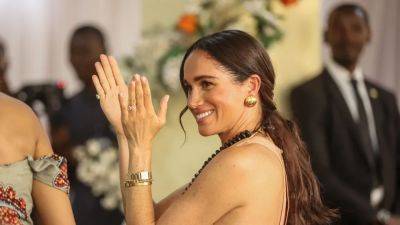 Meghan Markle's Latest Look May Contain a Message to the Royal Family - www.glamour.com - Nigeria