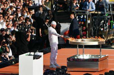 Olympic Flame Arrives In France Amid Tight Security In Test Run For Paris Opening Ceremony - deadline.com - France - Greece