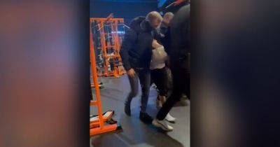 Moment terrorism suspect is dragged to floor and handcuffed as police raid busy gym - www.manchestereveningnews.co.uk - Manchester - county Lane